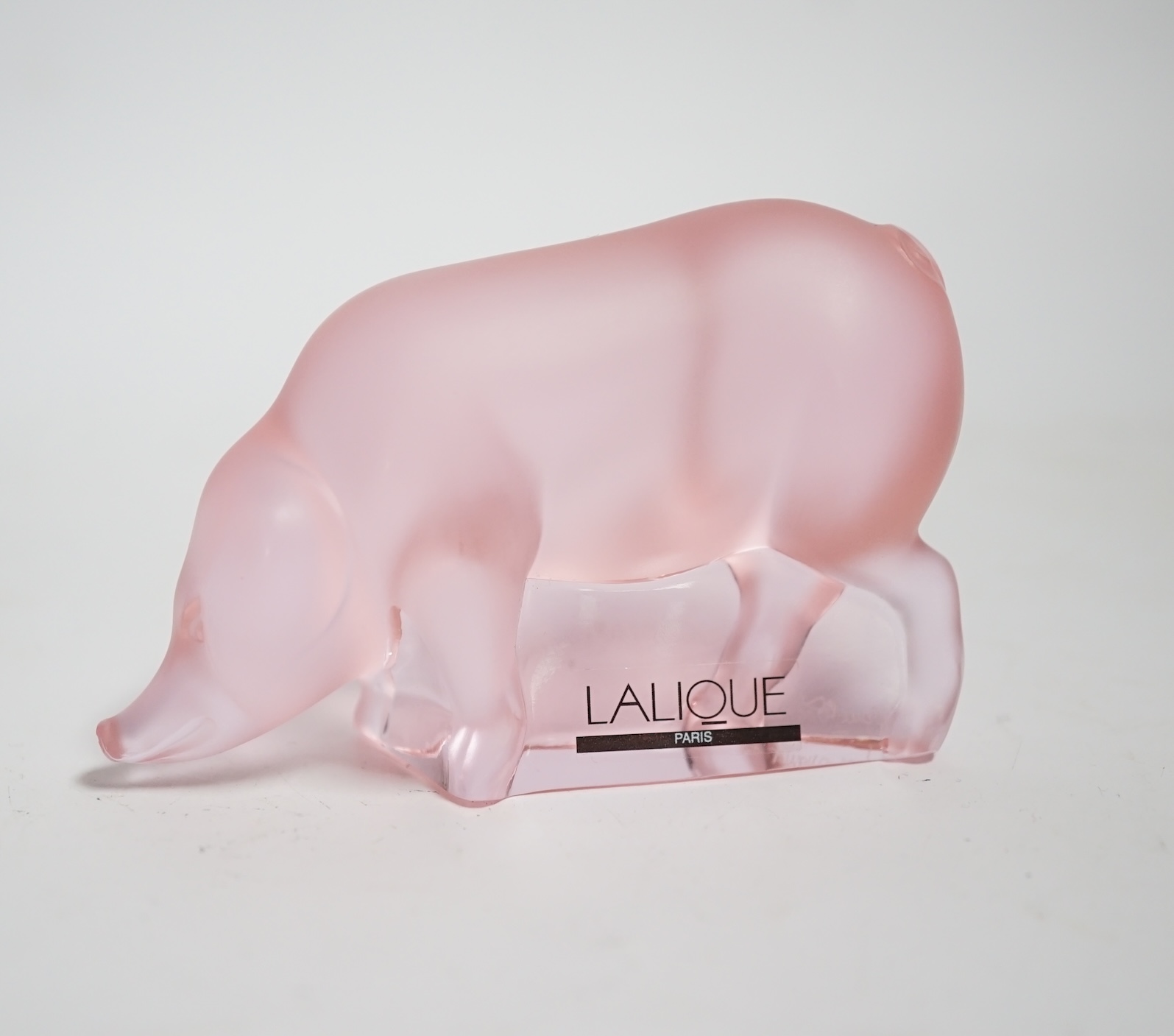 A modern Lalique pink glass pig, signed, 9cm wide